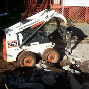 hydraulichammerbreakingconcretepatio.JPG