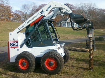 Country Landscaping - Bobcat with Auger