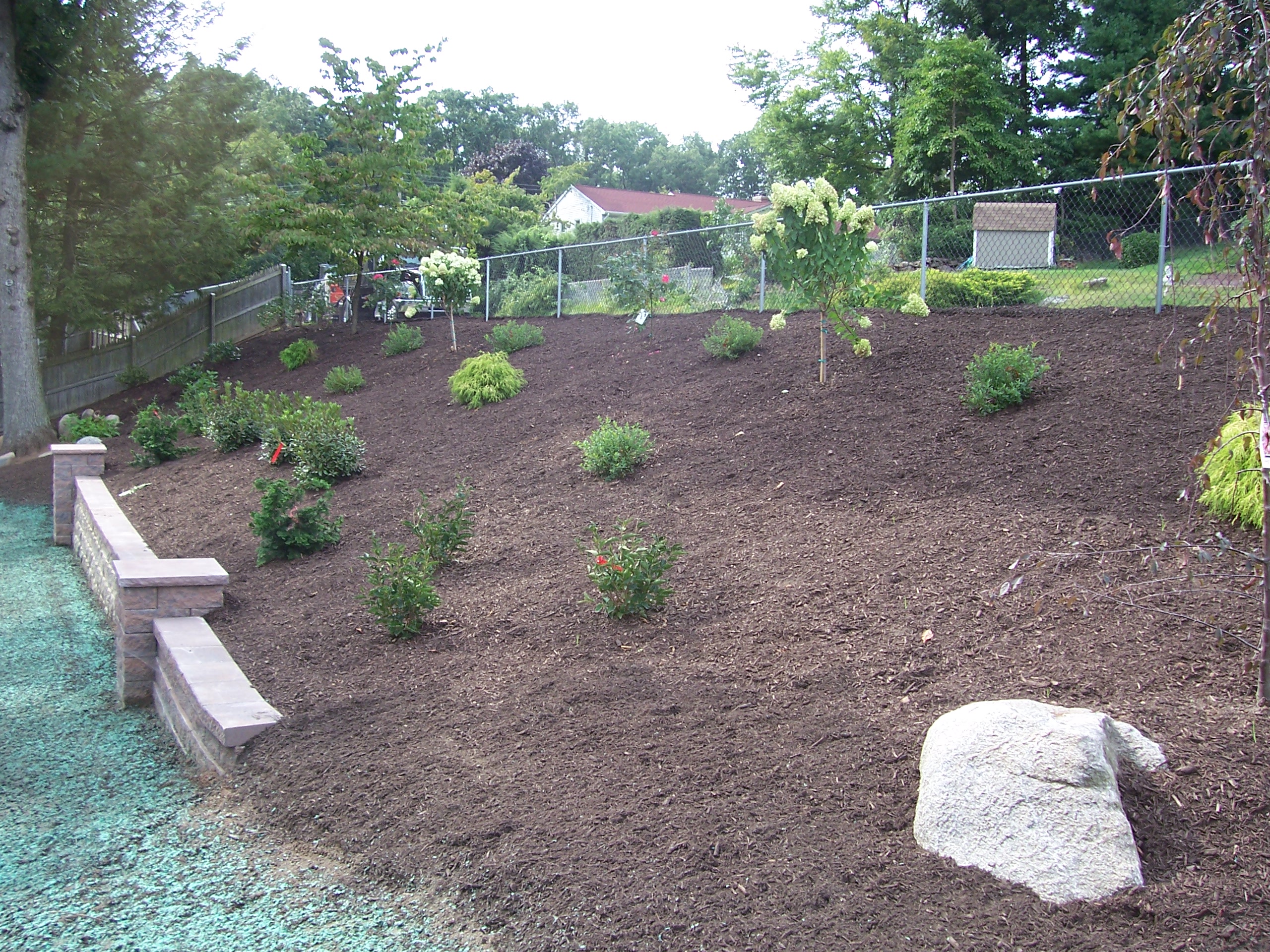 Backyard Hillside Garden | Country Landscaping, LLC