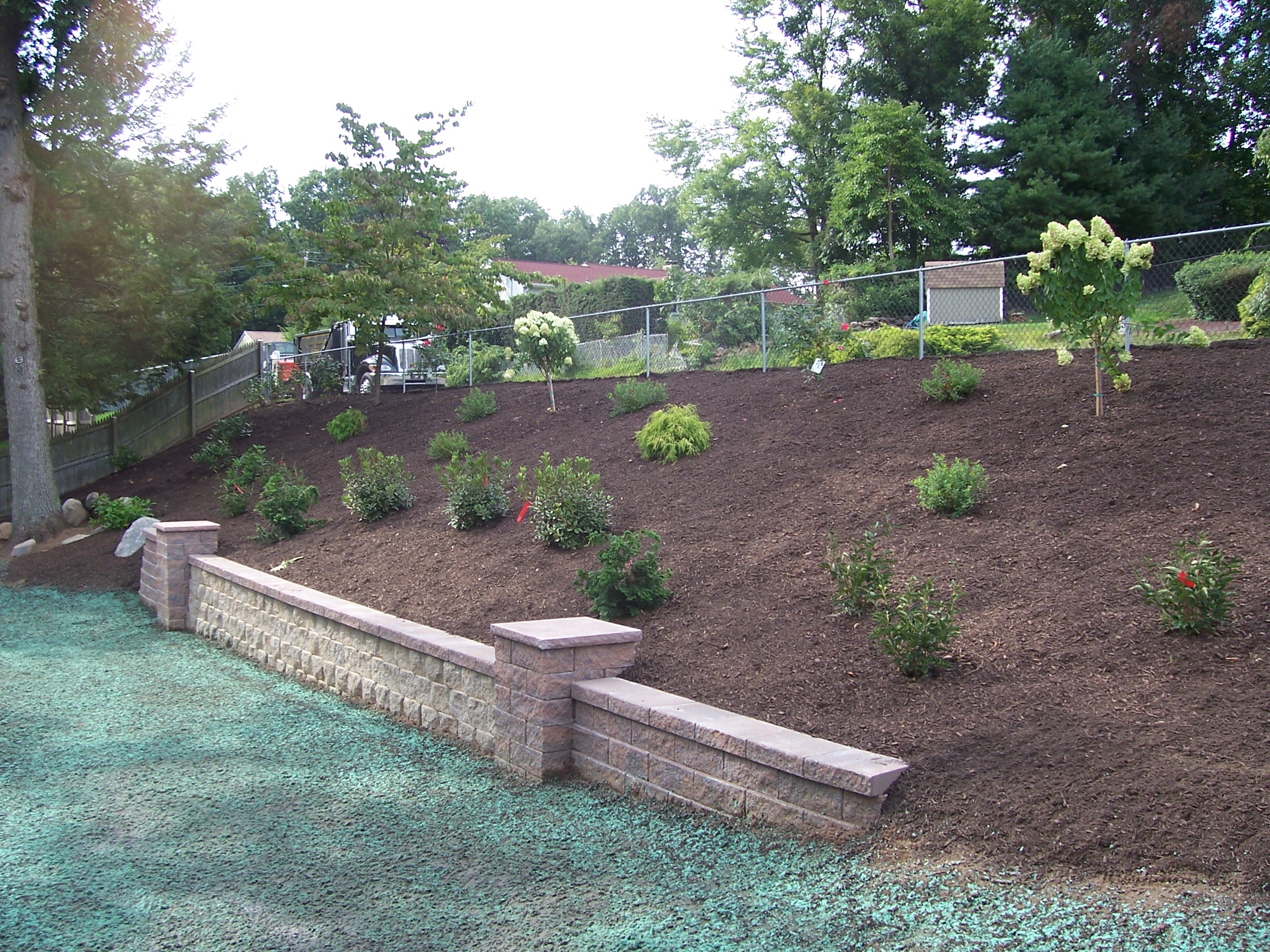 Backyard Hillside Garden | Country Landscaping, LLC