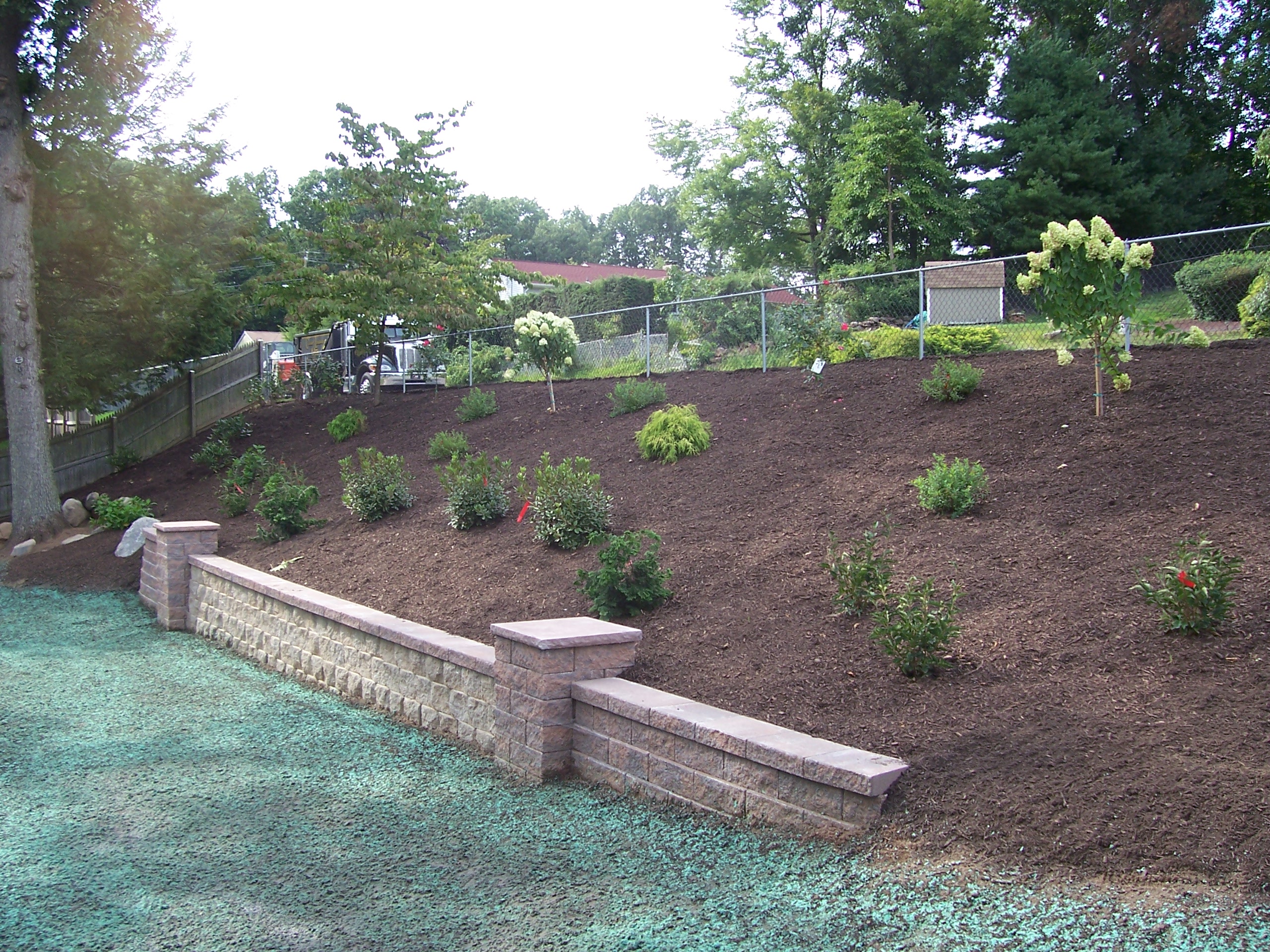 Backyard Hillside Garden Country Landscaping LLC